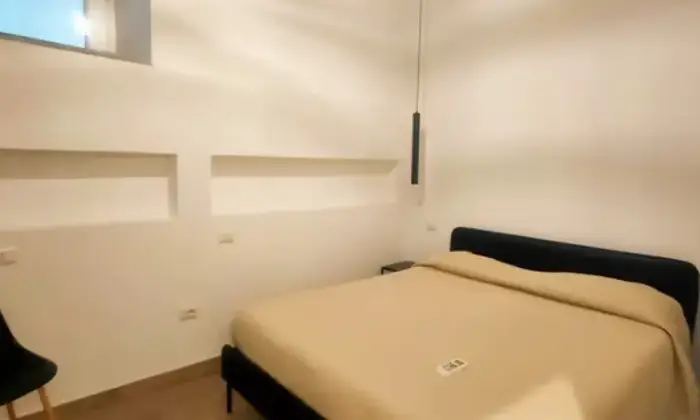 Rexer-Cagliari-Elegante-Residenza-San-giovanni-centralissima-CameraDaLetto