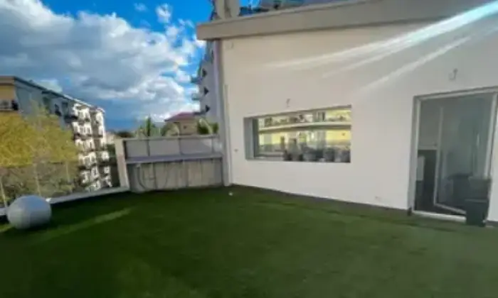 Rexer-Cosenza-Intero-edificio-multi-piano-Giardino