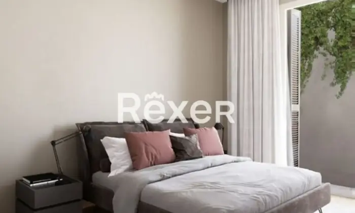 Rexer-SANREMO-Appartamento-tre-locali-con-ampi-balconi-CameraDaLetto
