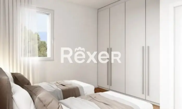 Rexer-SANREMO-Appartamento-con-giardino-vista-mare-CameraDaLetto