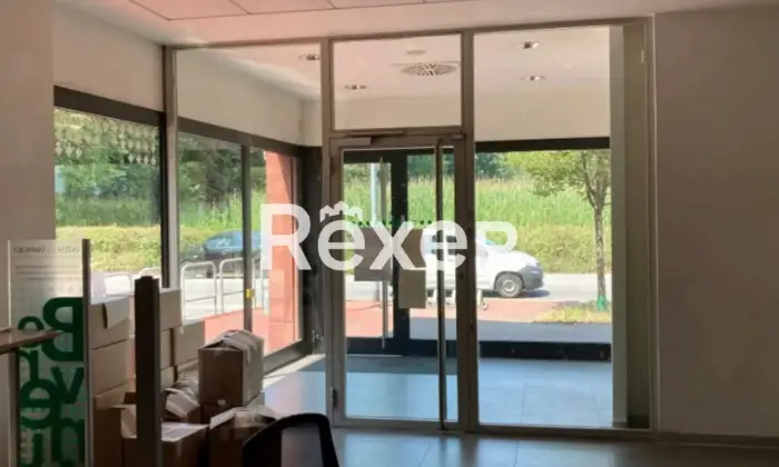Rexer-CORNAREDO-Ex-filiale-bancaria-ai-piani-terra-primo-ed-interrato-con-box-Altro