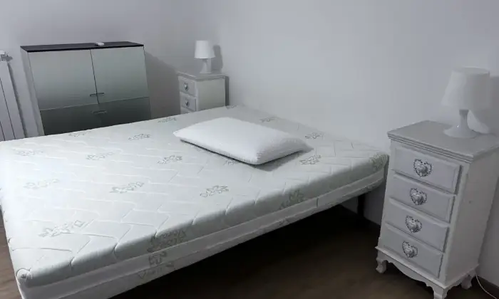 Rexer-Taranto-Vendesi-appartamento-pieno-centro-locato-CameraDaLetto