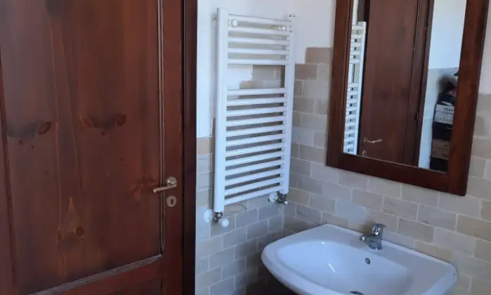 Rexer-Valderice-Villetta-a-schiera-con-giardino-dotato-di-ampio-posto-auto-Bagno
