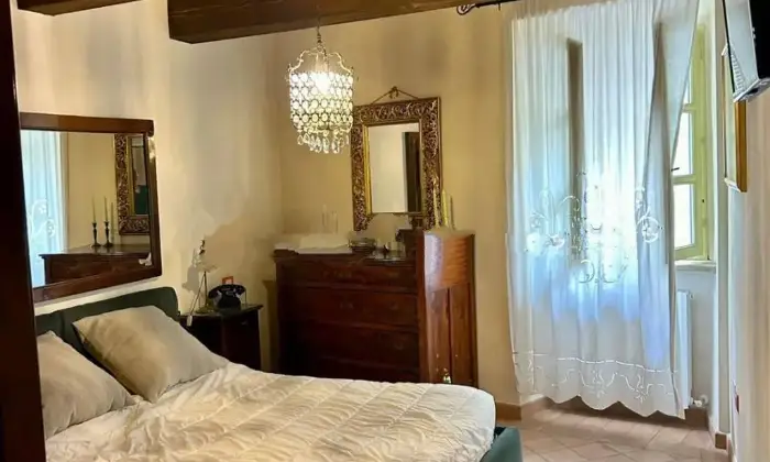 Rexer-Cagli-Vendesi-Bilocale-corso-Settembre-Centro-Cagli-CameraDaLetto