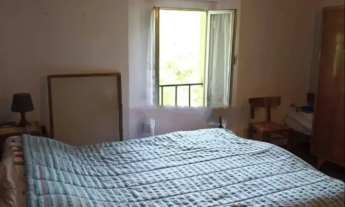 Rexer-Alto-Reno-Terme-Vendesi-Villa-a-schiera-in-Molino-di-TognarinoAlto-Reno-Terme-CameraDaLetto