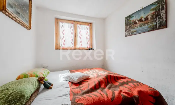 Rexer-Pasturo-Appartamento-a-Pasturo-Tranquillit-e-Comfort-nel-Cuore-della-Valsassina-CAMERA-DA-LETTO