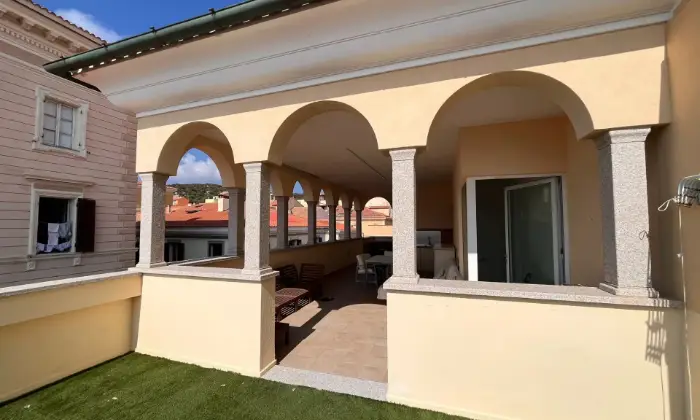 Rexer-La-Maddalena-Super-Attico-sul-Porto-turistico-di-Cala-Gavetta-Giardino