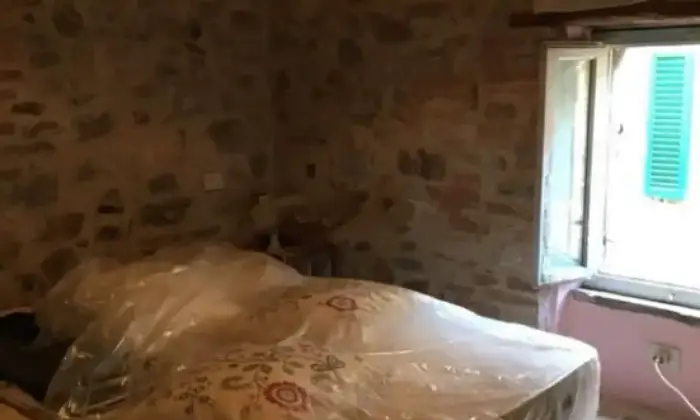 Rexer-Montalcino-Vendesi-casa-indipendente-in-borgo-di-Mezzo-Montalcino-CameraDaLetto