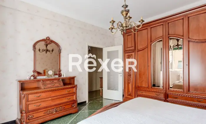 Rexer-Genova-Appartamento-mq-in-contesto-privato-CameraDaLetto