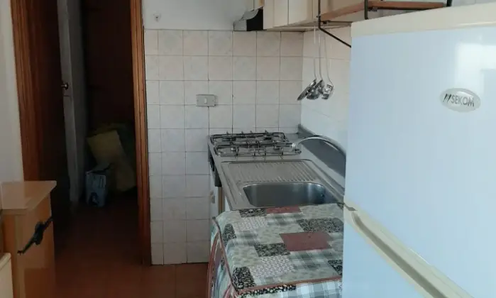 Rexer-Cir-Marina-Mansarda-con-ampio-terrazzo-e-vista-mare-prima-fila-Cucina