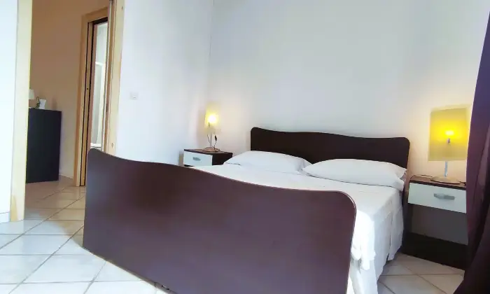 Rexer-Porto-Cesareo-Vendesi-appartamento-Villaggio-Chiusurelle-a-Porto-Cesareo-Camera-da-letto-matrimoniale