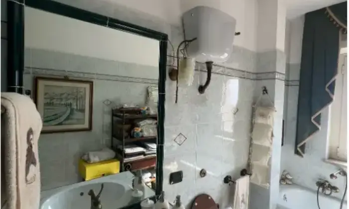 Rexer-Terracina-Vendesi-appartamento-con-garage-in-Via-Calcatore-a-Terracina-Bagno
