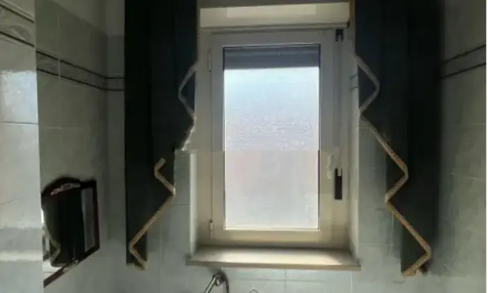 Rexer-Terracina-Vendesi-appartamento-con-garage-in-Via-Calcatore-a-Terracina-Bagno