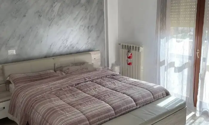 Rexer-Pomezia-Vendesi-Villa-a-schiera-via-Macerata-Pomezia-CameraDaLetto