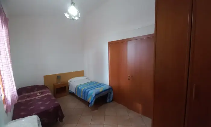 Rexer-Vittoria-Villa-con-grande-appartamento-climatizzato-CameraDaLetto