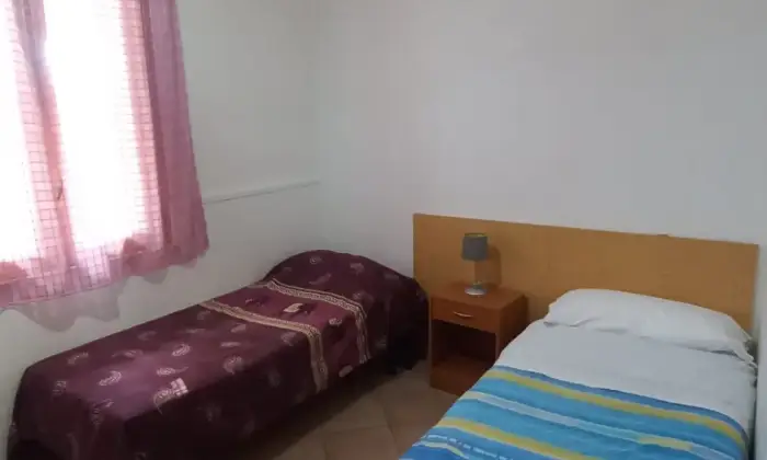 Rexer-Vittoria-Villa-con-grande-appartamento-climatizzato-CameraDaLetto