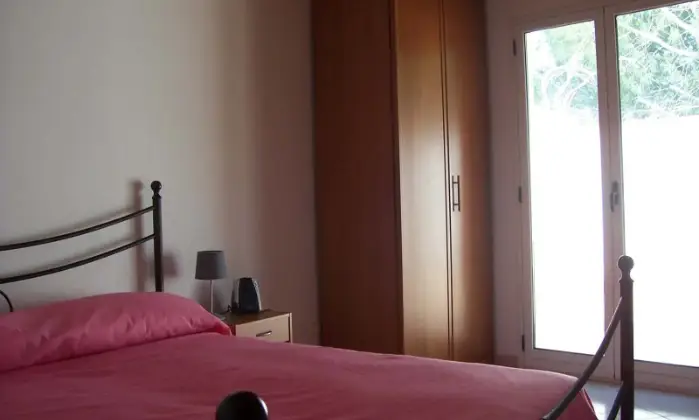 Rexer-Vittoria-Villa-con-grande-appartamento-climatizzato-CameraDaLetto