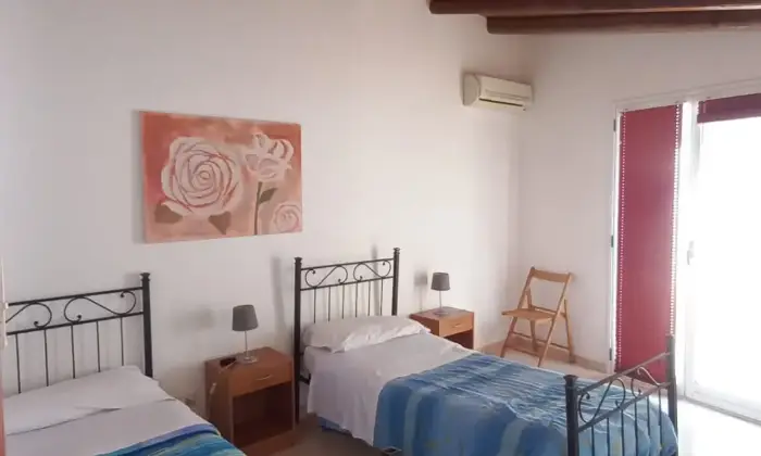 Rexer-Vittoria-Villa-con-grande-appartamento-climatizzato-CameraDaLetto