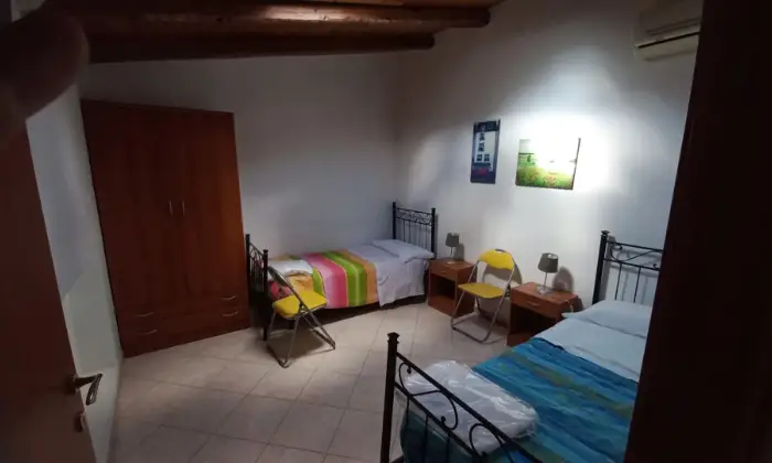 Rexer-Vittoria-Villa-con-grande-appartamento-climatizzato-CameraDaLetto