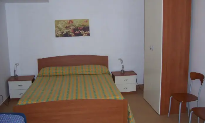 Rexer-Vittoria-Villa-con-grande-appartamento-climatizzato-CameraDaLetto