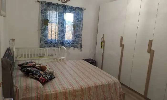 Rexer-Roma-Appartamento-in-vendita-in-via-Umberto-Grosso-a-Ostia-Ponente-Roma-CameraDaLetto