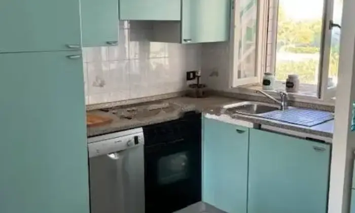 Rexer-Lesina-Vendesi-appartamento-in-Via-Plutone-Marina-Di-Lesina-Lesina-Cucina
