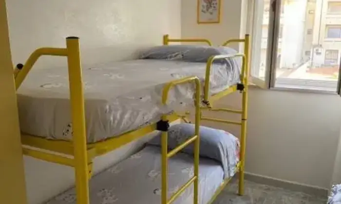 Rexer-Lesina-Marina-Vendesi-appartamento-in-Via-Plutone-Marina-Di-Lesina-Lesina-CameraDaLetto