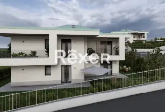 Rexer-CAPIAGO-INTIMIANO-Trilocale-con-giardino-Terrazzo