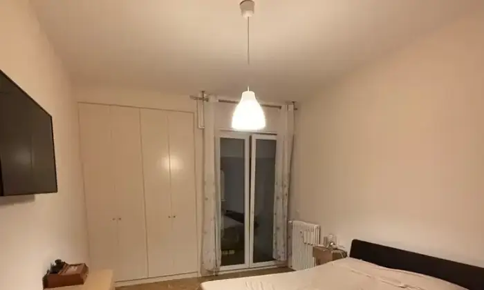 Rexer-Bologna-Appartamento-in-Via-Giovanni-Amendola-Bologna-CameraDaLetto