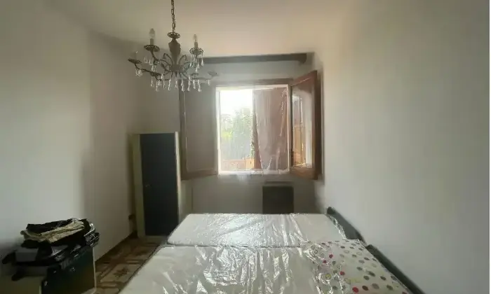 Rexer-Sciacca-Appartamento-in-Via-Solofra-Sciacca-CameraDaLetto