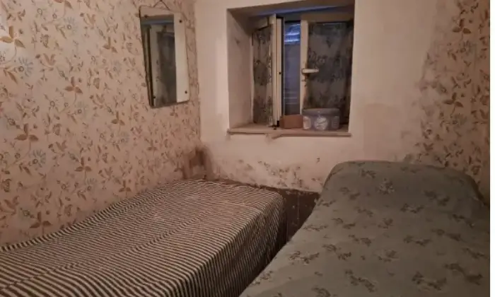 Rexer-Pescina-Casa-di-paese-in-vendita-in-via-Cristoforo-Colombo-Pescina-CameraDaLetto