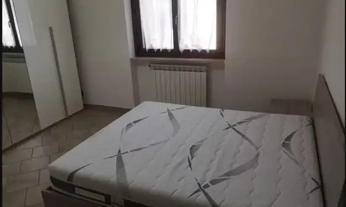 Rexer-Monterotondo-Appartamento-in-Complesso-Residenziale-CameraDaLetto