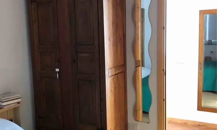 Rexer-Novara-Trilocale-con-doppio-giardino-in-contesto-di-cascina-finemente-ristrutturata-CameraDaLetto