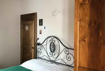 Rexer-Novara-Trilocale-con-doppio-giardino-in-contesto-di-cascina-finemente-ristrutturata-CameraDaLetto
