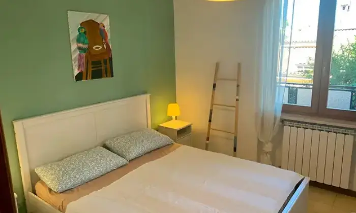 Rexer-Ardea-Appartamento-in-Via-Scrivia-Ardea-CameraDaLetto