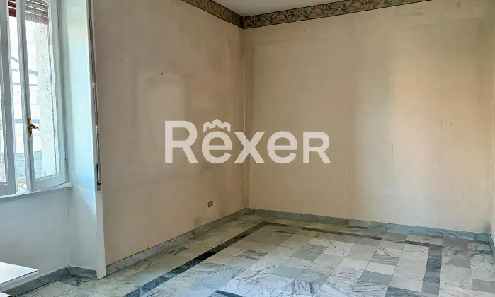 Rexer-Roma-Bilocale-spazioso-ai-piani-alti-in-stabile-con-portineria-Salone