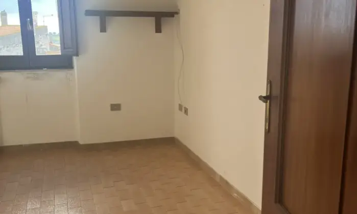 Rexer-Ghilarza-Edificio-composto-appartamenti-ufficio-e-magazzino-centro-storico-Camera-da-letto