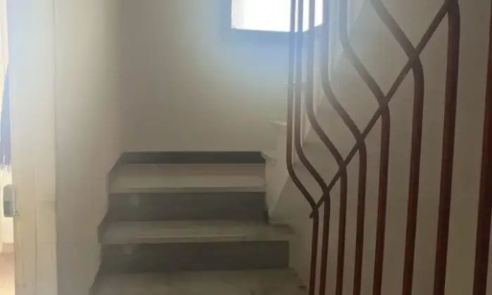 Rexer-Ghilarza-Edificio-composto-appartamenti-ufficio-e-magazzino-centro-storico-Scala