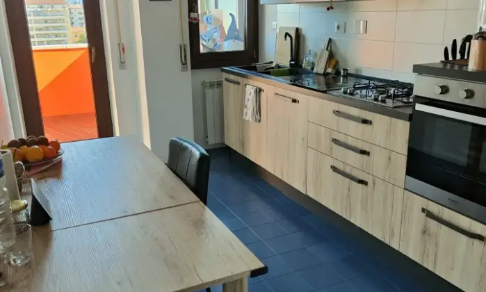 Rexer-Firenze-Eleganza-e-comfort-al-piano-con-garage-Cucina