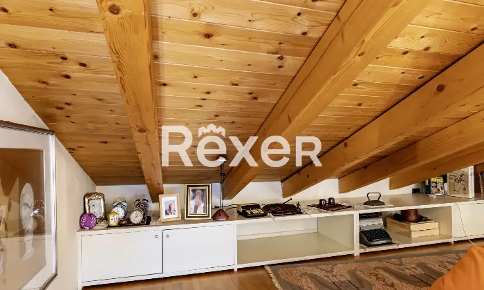 Rexer-Bergamo-Elegante-mansarda-con-travi-a-vista-Altro