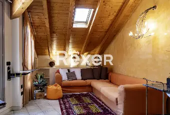 Rexer-Bergamo-Elegante-mansarda-con-travi-a-vista-Altro