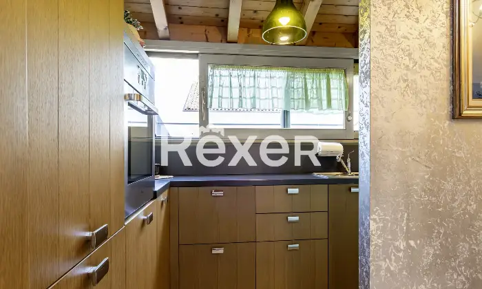 Rexer-Bergamo-Elegante-mansarda-con-travi-a-vista-Altro