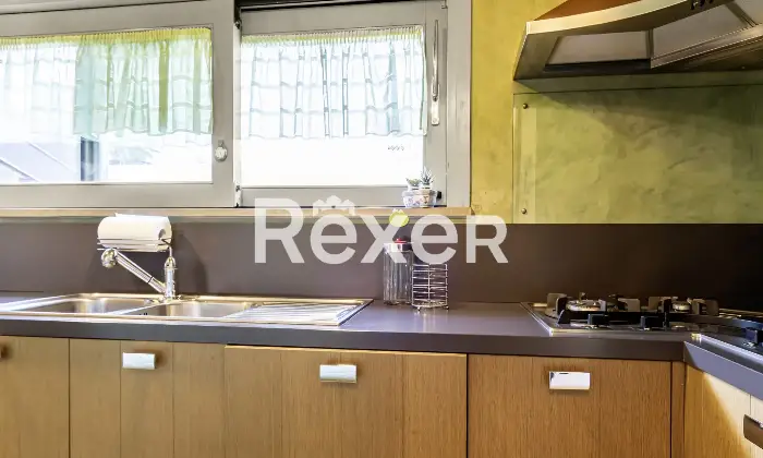 Rexer-Bergamo-Elegante-mansarda-con-travi-a-vista-Altro