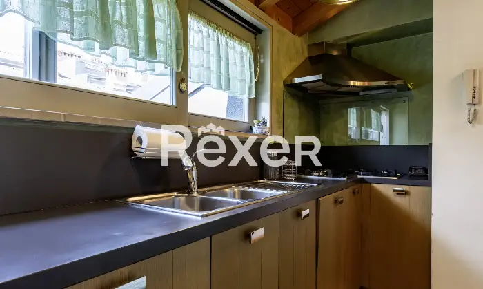 Rexer-Bergamo-Elegante-mansarda-con-travi-a-vista-Altro