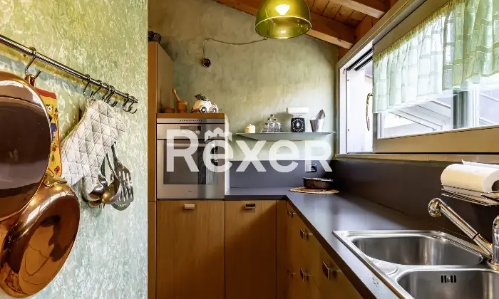 Rexer-Bergamo-Elegante-mansarda-con-travi-a-vista-Altro