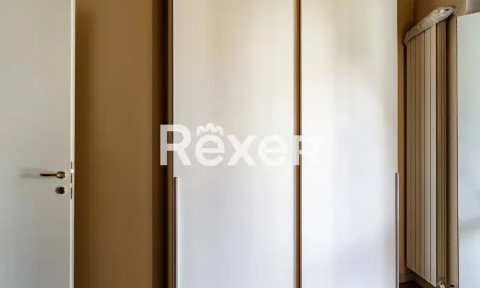 Rexer-Bergamo-Elegante-mansarda-con-travi-a-vista-Altro