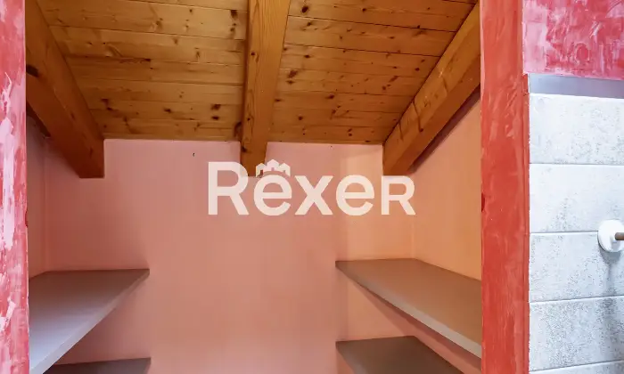 Rexer-Bergamo-Elegante-mansarda-con-travi-a-vista-Altro