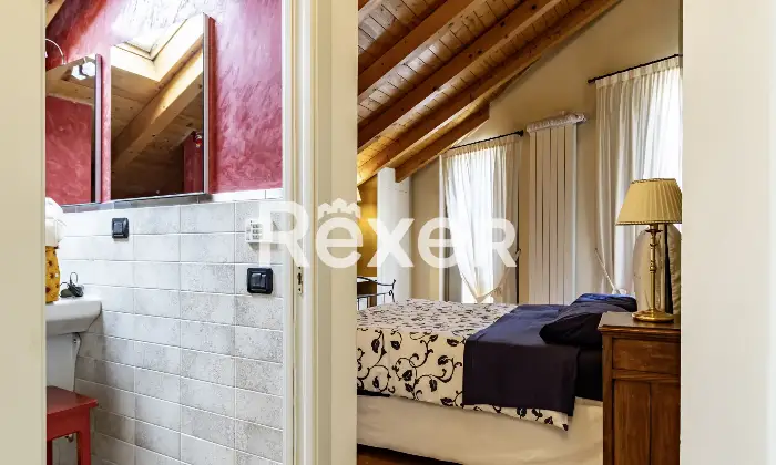 Rexer-Bergamo-Elegante-mansarda-con-travi-a-vista-Altro
