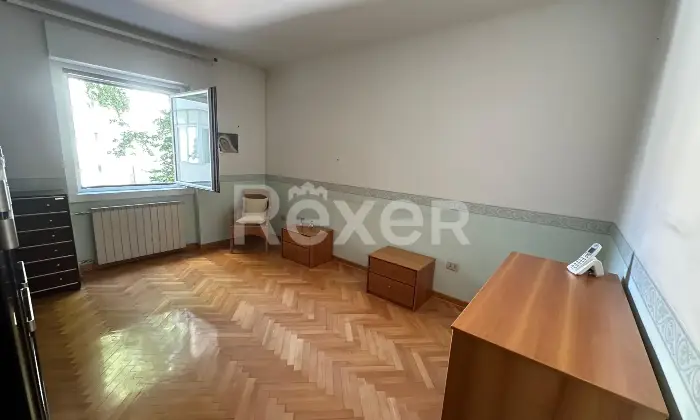Rexer-Trieste-Accogliente-Trilocale-con-balcone-verandato-Altro