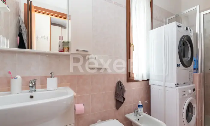 Rexer-Verderio-Inferiore-Bilocale-a-reddito-con-doppia-terrazza-e-vista-aperta-sul-verde-Altro